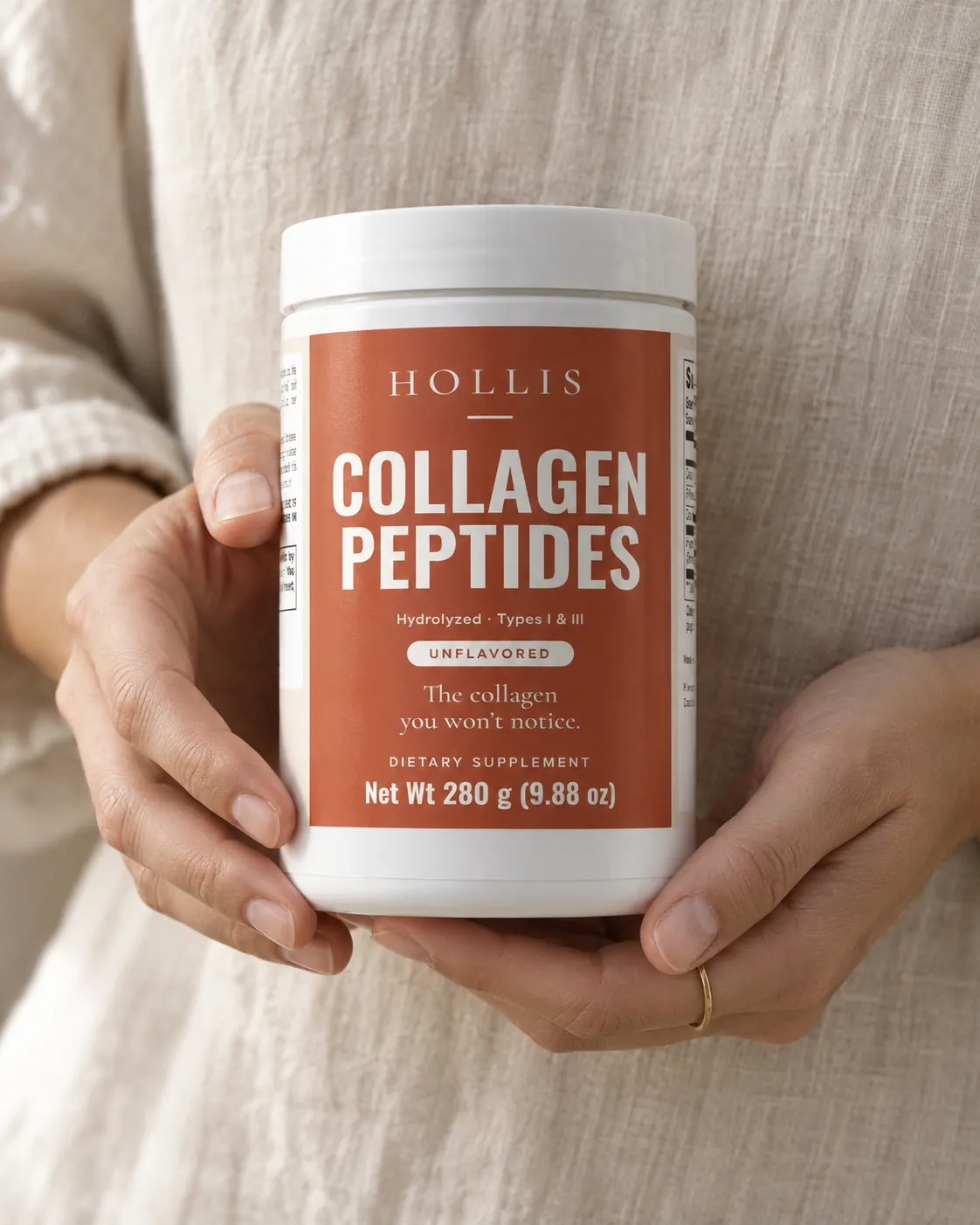 Hands holding a container of Hollis Collagen Peptides